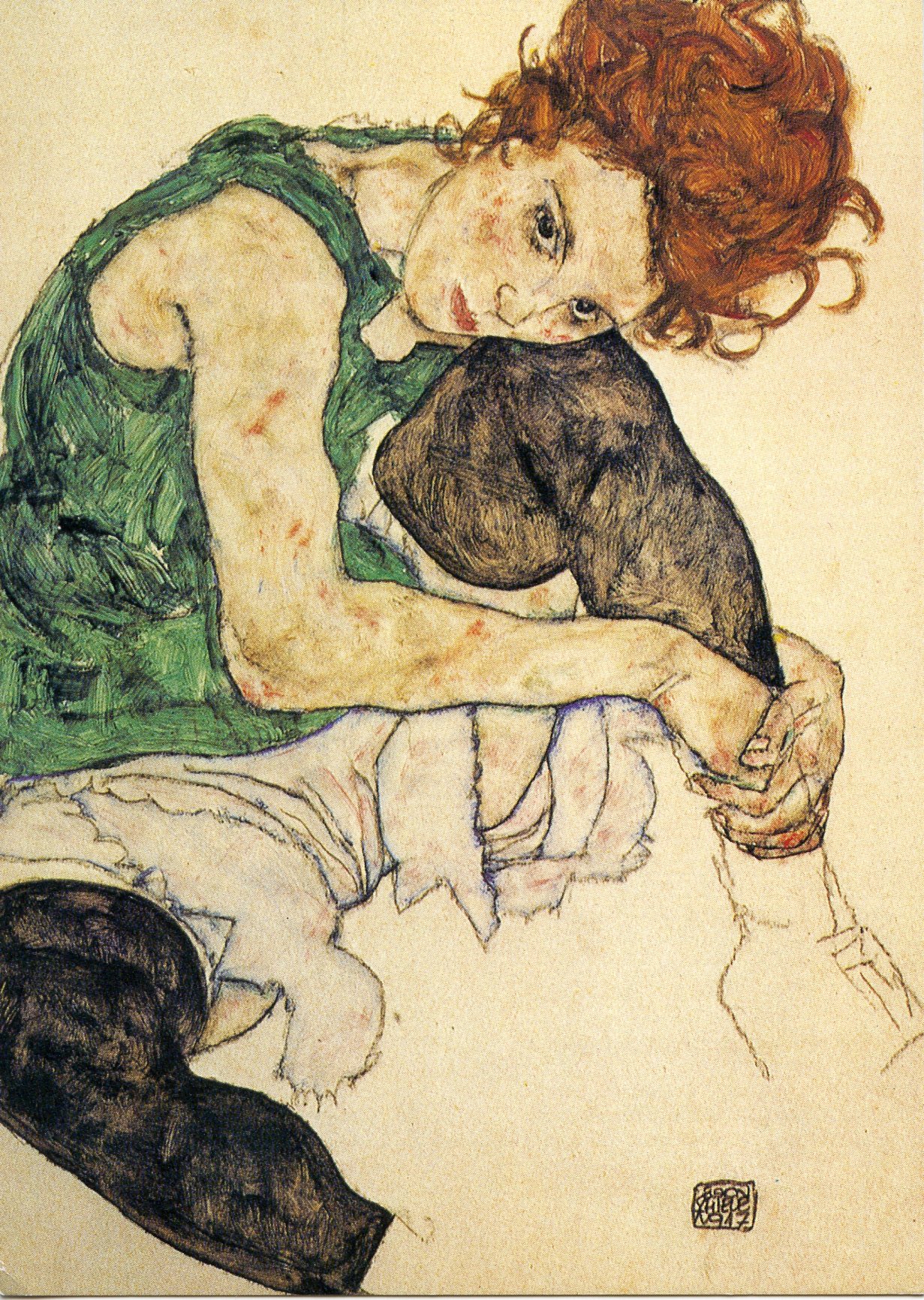 Siitzende Frau